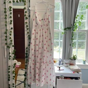 White dress with pink flowers.